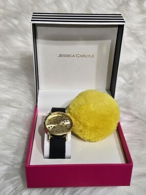 Women's Gold Dial Watch with Black Band and Yellow Pom